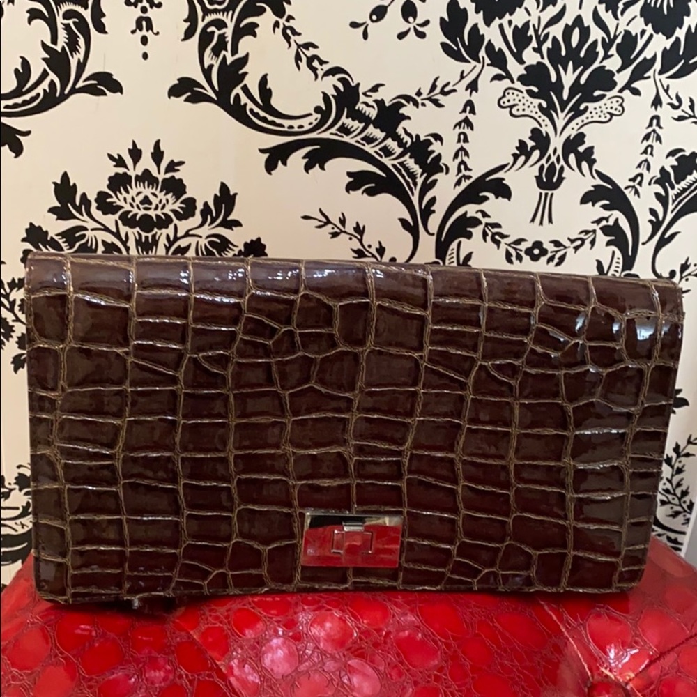 Brown oversize croc print patent clutch